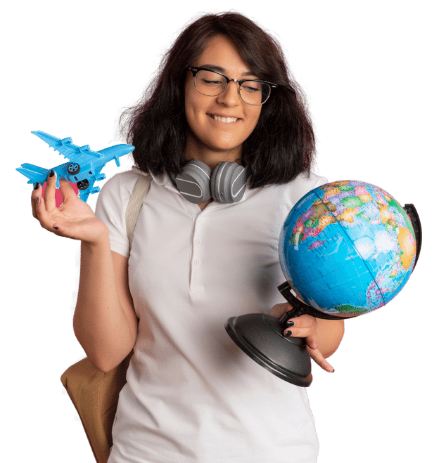 a girl holding a globe and a toy plane in both her hand