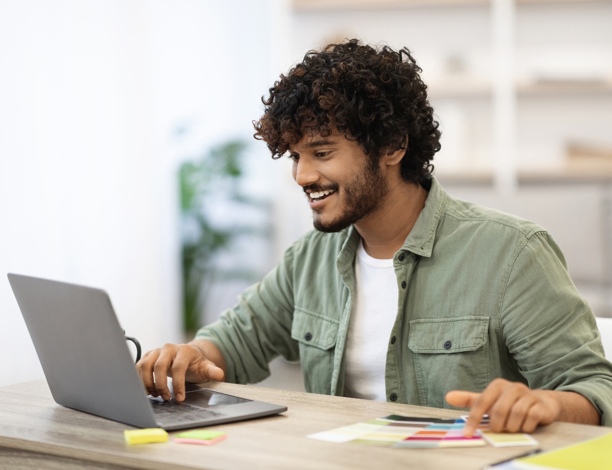 a happy male student planning to study in Australia